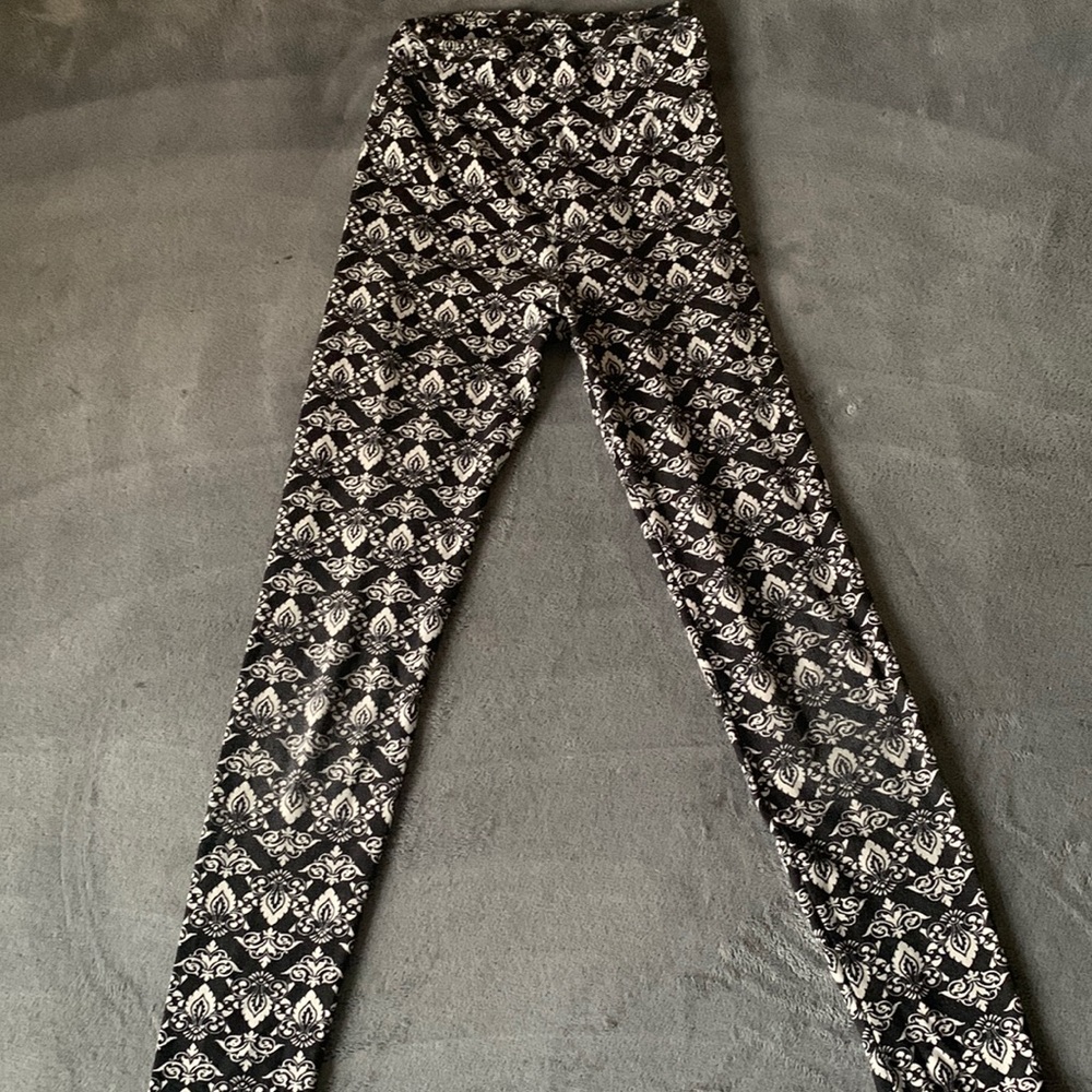 I am selling these leggings for only $5!! They are black and white.